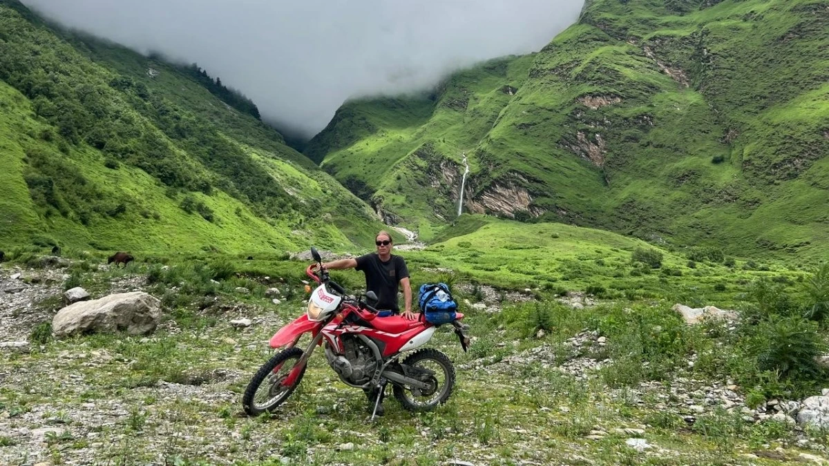 Rider Posing with bike on a motorbike tour in Nepal